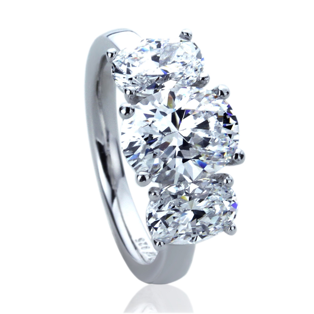 Women 9mm Platinum Plated Silver 3.5ct Oval CZ Three Stone Engagement Ring